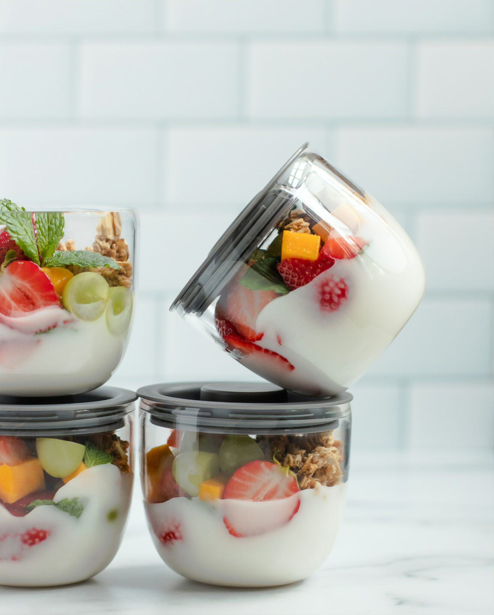 Containers of yogurt and fruit