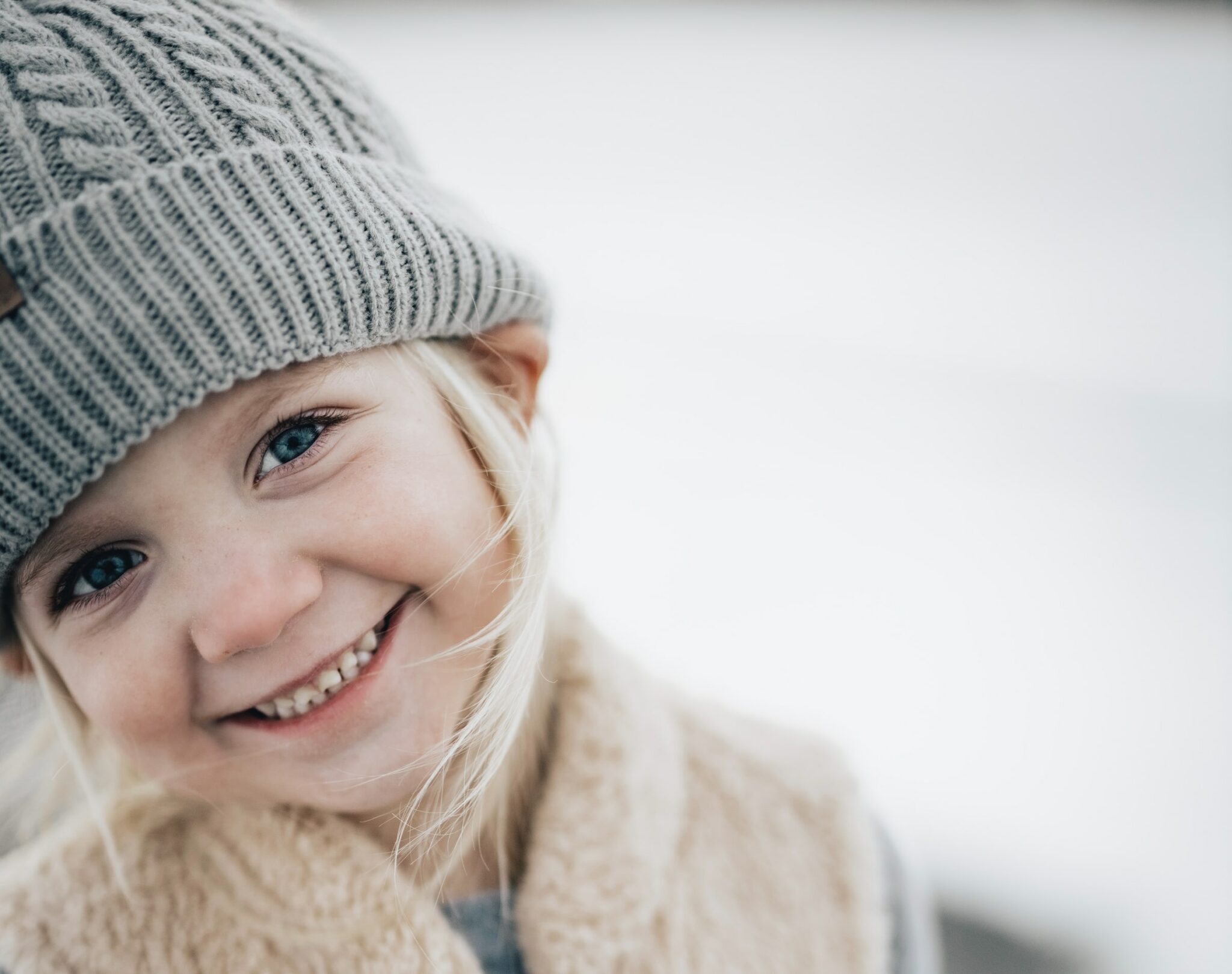 little girl wearing a stocking cap