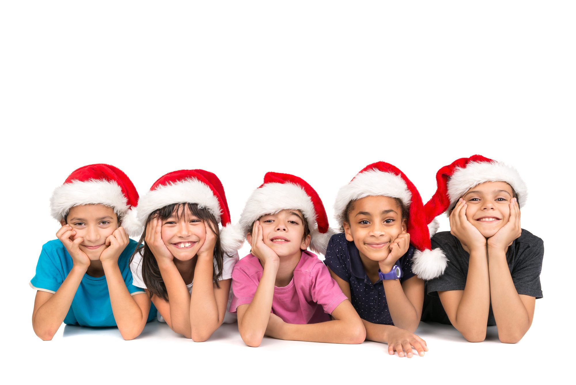 five smiling children wearing santa hats on white backgroun
